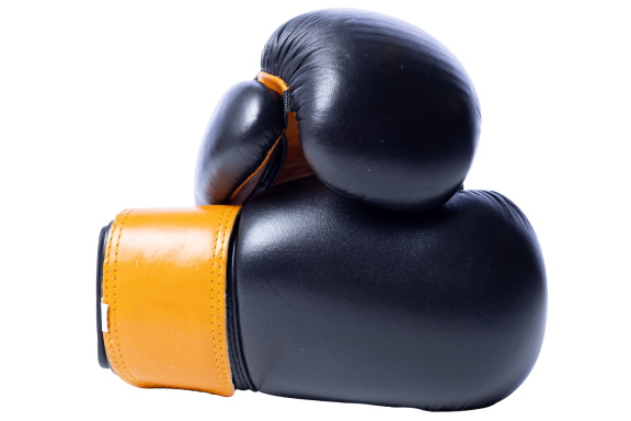Faze XTR Headguard Black and orange boxing glove angled to show its contours.